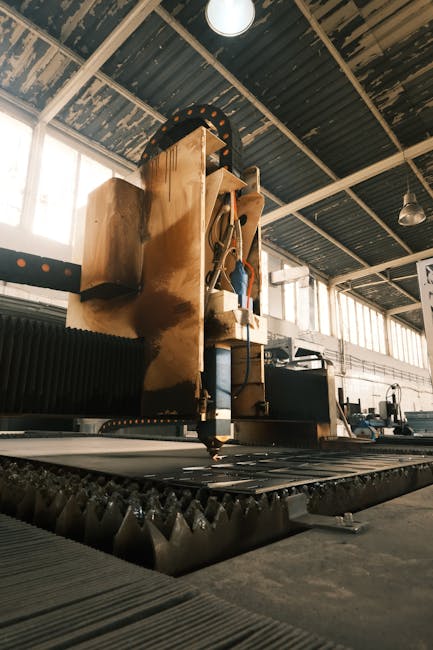automated automotive production line with robotic arms assembling cars