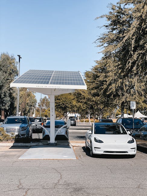 electric vehicle battery technology and charging systems in modern automotive facility
