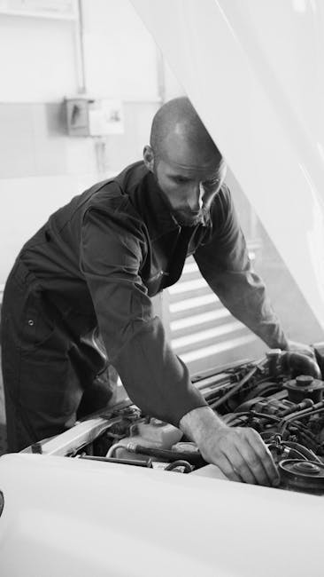 professional automotive engineering team working on innovative car technology